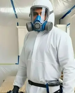 Masking off a kitchen before spraying
