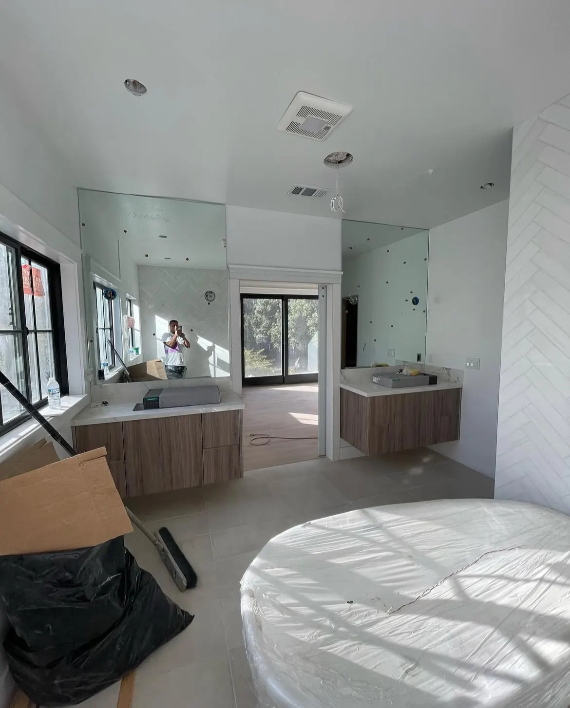 Bathroom with white walls and a freestanding tub